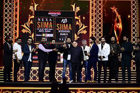 SS Rajamouli, known for his Oscar-nominated RRR, won Best Director at the SIIMA Awards 2023, alongside Ram Charan, marking a significant achievement in the Telugu film industry.