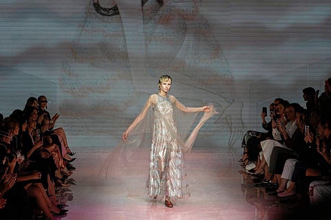 In frame: A model wears a creation as part of the Giorgio Armani women's Spring Summer 2024 collection presented in Milan