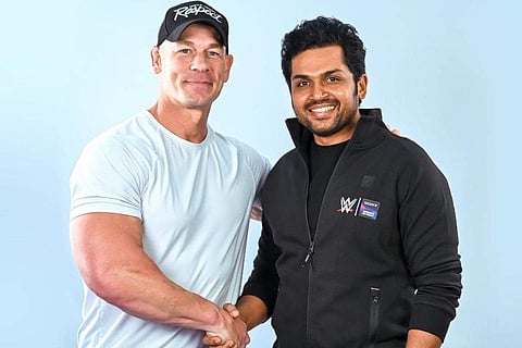 Telugu actor Karthi shares pic with John Cena from Hyderabad ahead of WWE Spectacle