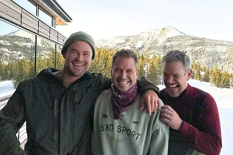 In frame: Matt Damon and Chris Hemsworth with a friend