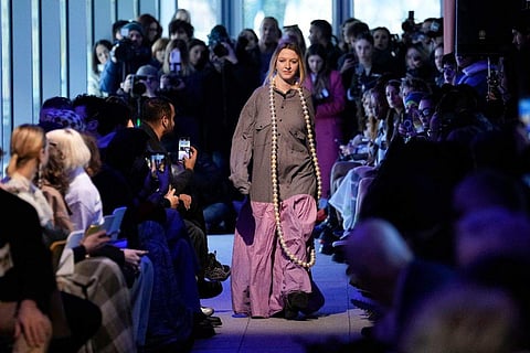 In frame: A model wears a creation part of the men's Simon Cracker Fall-Winter 2024-2025 collection