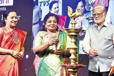 Telangana Governor Dr Tamilisai Soundararajan inaugurates the 26th Devi Awards by lighting a lamp as TNIE CEO Lakshmi Menon and Editorial Director Prabhu Chawla look on