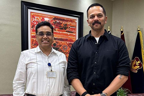 In frame: Rohit Shetty with Manoj Kumar Sharma