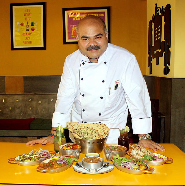 Rang De Basanti Dhaba's chef Siddharth Joardar with a few special dishes