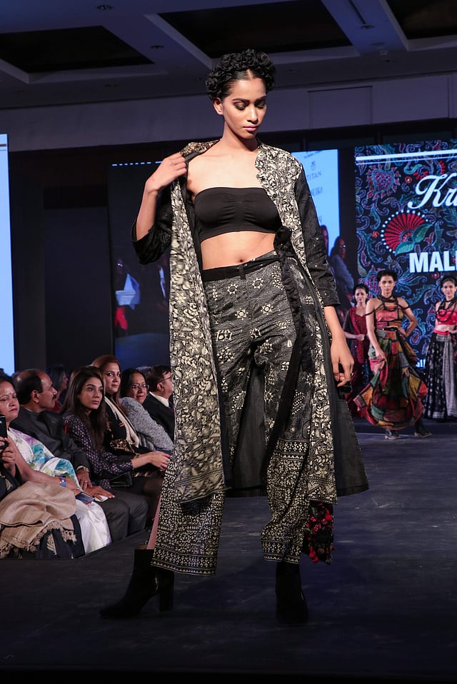 <em>A split-hem kantha embroidered palazzo with a matching jacket</em>