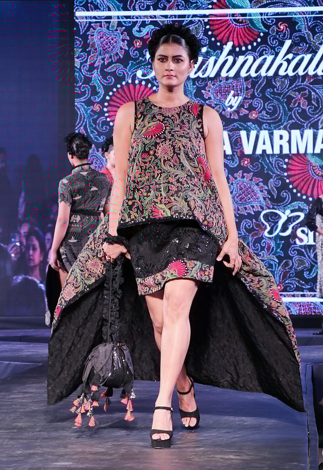 <em>An elaborate peplum kantha top and embroidered skirt</em>