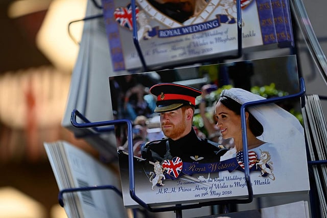 <em>Royal memorabilia of Harry and Meghan (AFP/DANIEL LEAL-OLIVAS)</em>