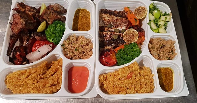 Chef Inam ensures all meals are neatly packed