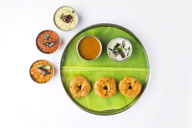 Vadas with an assortment of chutneys and sambar MLA pesarattu