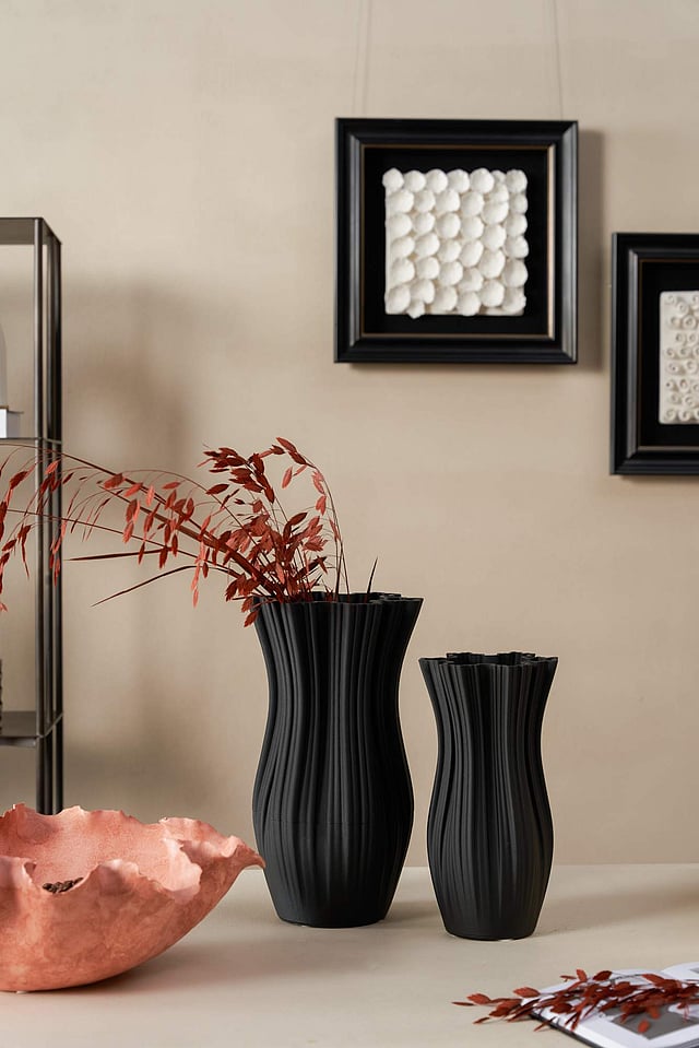 <em>Black flower vase from Rococo Milano</em>