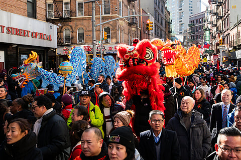In frame: Revelers gather to attend the parade for the Chinese New Year