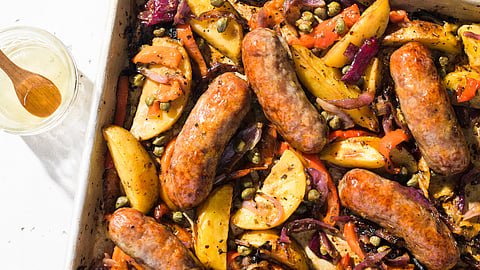 In frame: Sausage, potato, and pepper traybake 