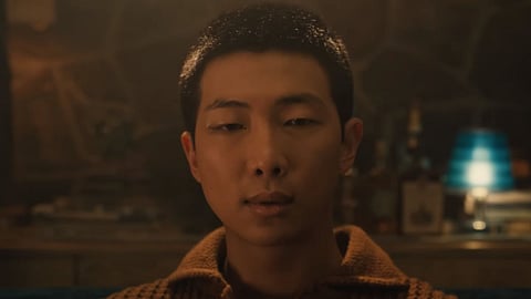 In frame: RM in the Come Back To M video