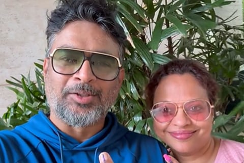R Madhavan with his wife, Sarita after voting