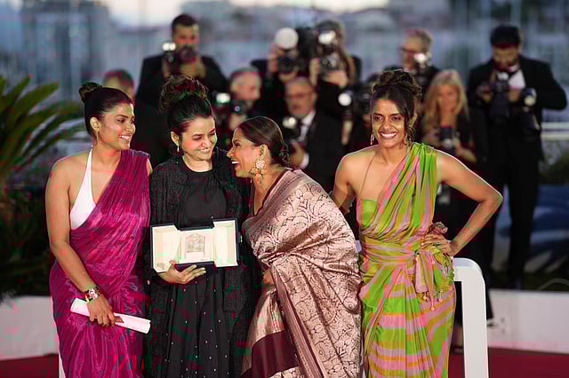 Actor Divya Prabha with the team of All We Imagine as Light at Cannes