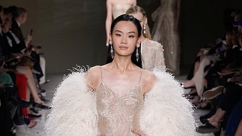 In frame: A model walks the ramp donning a piece from the collection 