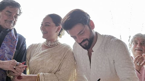 Shatrughan Sinha with Sonakshi Sinha and Zaheer Iqbal (L to R)