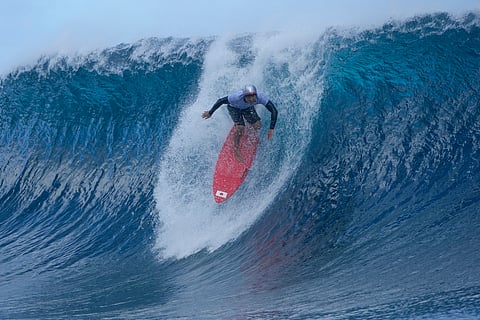 Reo Inaba, of Japan, surfs during a training day ahead of the 2024 Summer Olympics surfing competition (July 23) in Teahupo'o, Tahiti