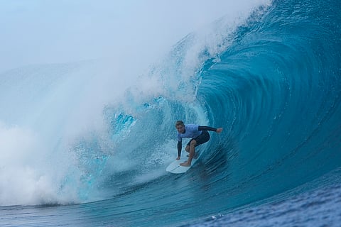Ethan Ewing, of Australia, surfs during a training day ahead of the 2024 Summer Olympics surfing competition (July 23) in Teahupo'o, Tahiti