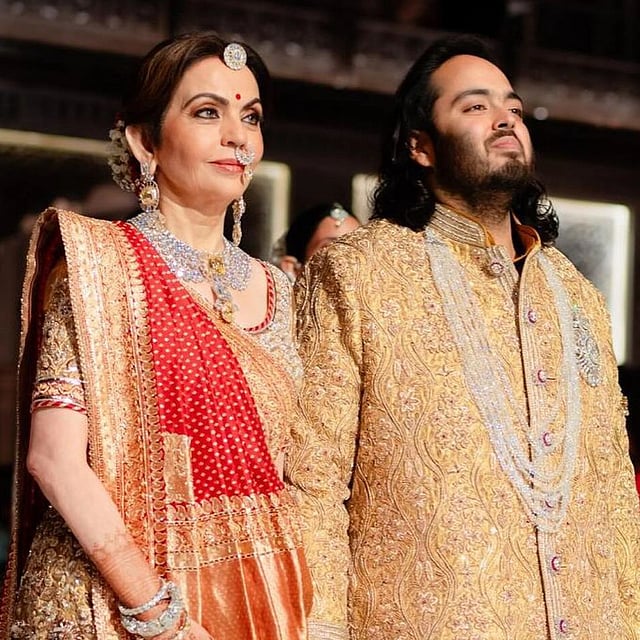 Nita and Anant. Anant is wearing it as a brooch here