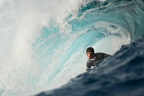Joao Chianca, of Brazil, surfs on a training day ahead of the 2024 Summer Olympics surfing competition (July 23) in Teahupo'o, Tahiti