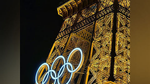 In Frame: Eiffel Tower lit up in Olympic colours ahead of Paris 2024 opening ceremony