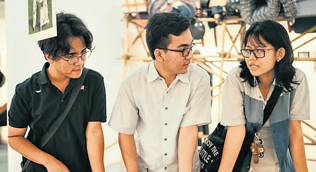 Visitors at the photography section