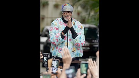 Amitabh Bachchan waiving at his fans in his residence in Mumbai