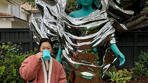 Priscilla Chan with the statue