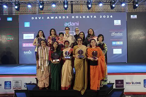 Top Row (Left to right) actor Preeti Panigrahi; singer Barnali chattopadhyay; filmmaker Sarmistha Maiti; former Union Minister and Chief Guest Smriti Irani; Editorial Director The New Indian Express Group Prabhu Chawla; alternative medicine practitioner Dr Pritee Ganatra; heritage conservationist Mukul Agarwal; fashion designer Pallavi Singhee. 

Bottom Row (Left to right)artist Sanhita; animal welfare activist Titas Mukherjee; idol maker Mala Paul; mental health advocate Dr Minu Budhia; dancer Priti Patel.
 
Other devis (not in picture) actor Subhashree Ganguly and actor-trainer Daminee Benny Basu.  