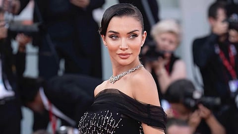 Amy Jackson makes her first public appearance after marriage, graces Venice Film Festival’s red carpet in an Alberta Ferretti gown 