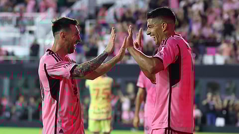 Lionel Messi and Luis Suarez