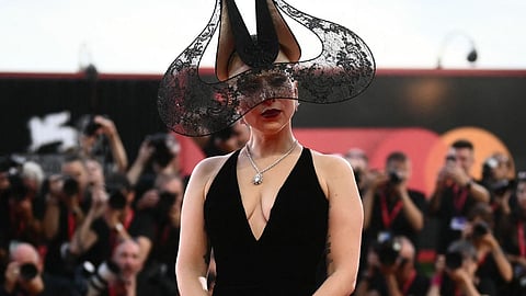 Venice Film Festival: Lady Gaga steals the show at ‘Joker: Folie à Deux’ premiere in a Dior gown and Philip Treacy lace headpiece 