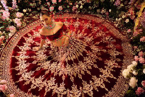 Kacey Musgraves (left), David Lauren and Lauren Bush Lauren attend the Ralph Lauren Spring/Summer 2025 fashion show as part of New York Fashion Week (Sept. 5, 2024) at Khalily Stables in Bridgehampton, NY