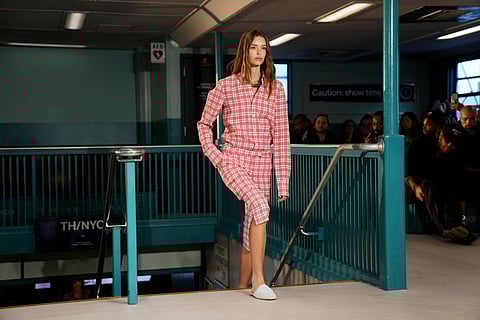 A model walks the runway during the Tommy Hilfiger Spring/Summer 2025 fashion show onboard a Staten Island Ferry as part of New York Fashion Week on Sunday, Sept. 8, 2024, in New York