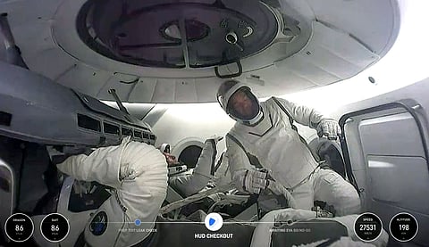 This image made from a SpaceX video shows the crew of the first private spacewalk led by tech billionaire Jared Isaacman inside the capsule on Sept. 12, 2024