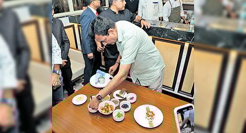 In Frame: Chef Sanjeev Kapoor prepares a special fusion dish