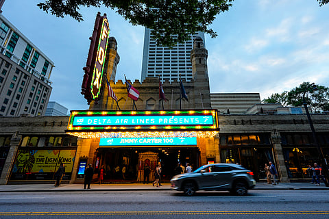 People wait in line ahead of a 'Jimmy Carter 100: A Celebration in Song' concert at the Fox Theatre on Sept. 17, 2024, in Atlanta