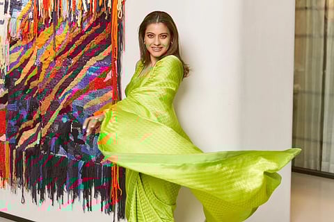 Kajol glows in an all-green saree, asks what colour would laughter be