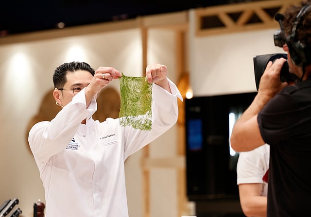 Kristian Baumann showing off a sheet of seaweed