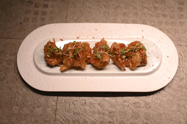 Wok-tossed ginger oyster prawns