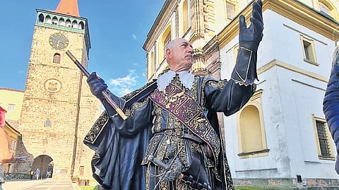A local guide dressed as a Medieval Duke