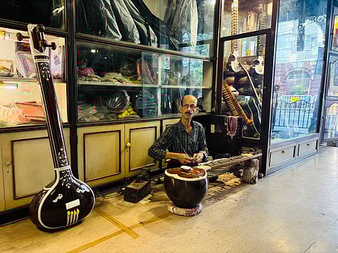 A stringed instrument getting repaired at Monoj Kumar Sardar & Bros