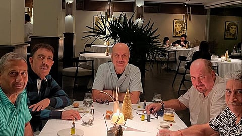 Anupam Kher (C) with his friends 