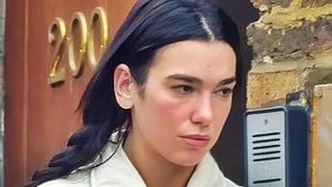 Dua Lipa flaunts engagement ring as she runs errands in London