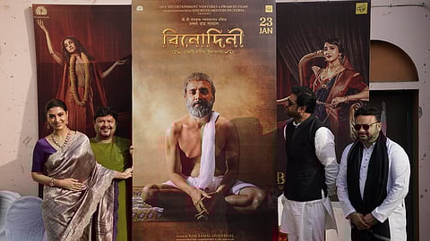 Rukmini Maitra and Ram Kamal Mukherjee (in green) with the new poster along with the musician duo Soumyojit and Sourendro