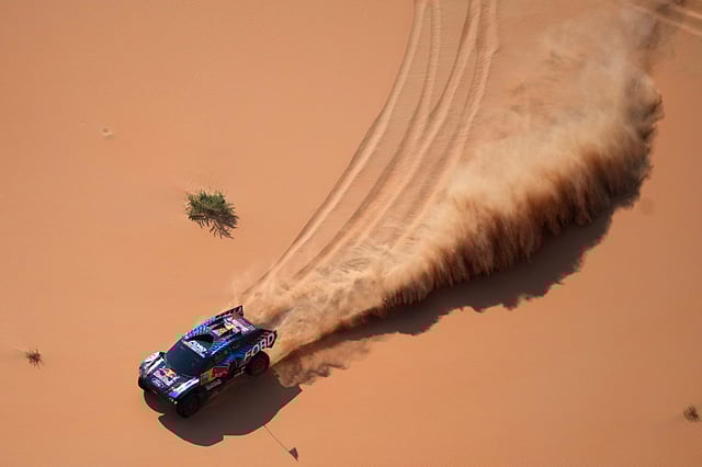 Mitchell Guthrie and co-driver Kellon Walch compete during the tenth stage of the Dakar Rally between Haradh and Shubaytah, Saudi Arabia, Wednesday, Jan. 15, 2025.