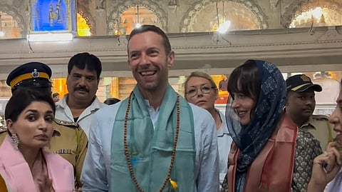 Chris Martin, Dakota Johnson shut down split rumours as they hold hands in India