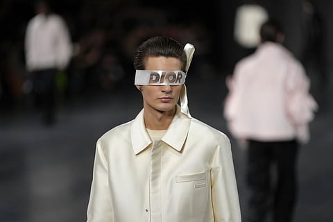 A model wears a creation as part of the men's Dior Homme Fall-Winter 2025-2026 collection, presented in Paris