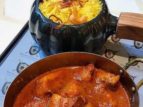 Coconut pilaf with pork vindaloo